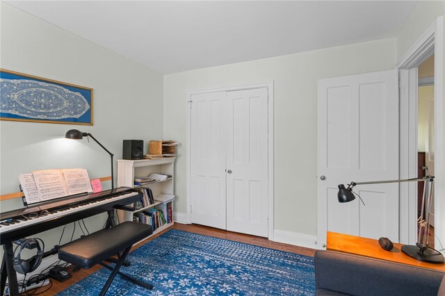 office featuring wood finished floors and baseboards