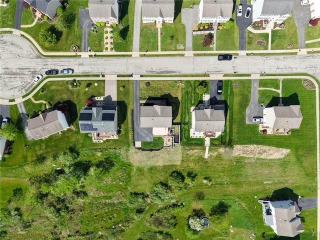 aerial view of property's location featuring nearby suburban area