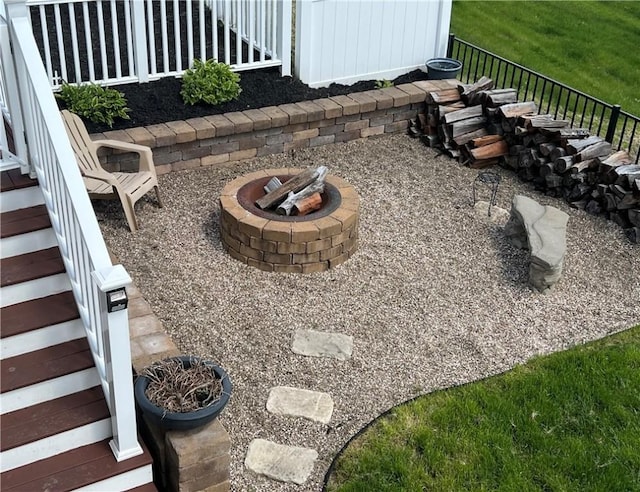 view of patio with an outdoor fire pit