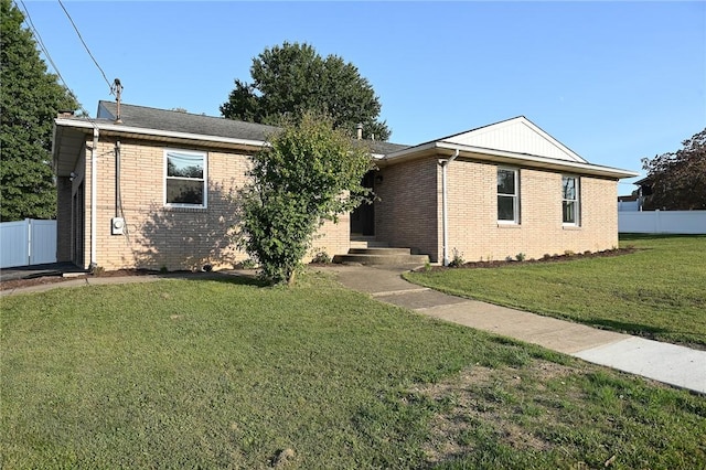 ranch-style house with brick siding