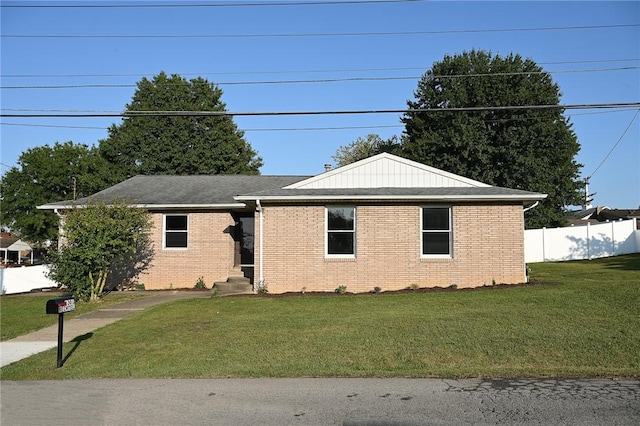 ranch-style house with brick siding
