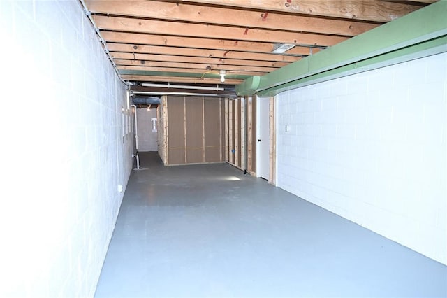 unfinished below grade area with concrete block wall