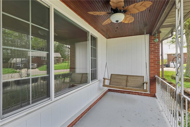 balcony featuring a ceiling fan