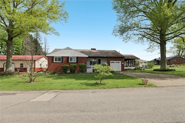 114 Cherry Ln, Center Twp Bea, PA 15001 - ranch-style house with an attached garage, asphalt driveway, brick siding, a front yard, and a chimney