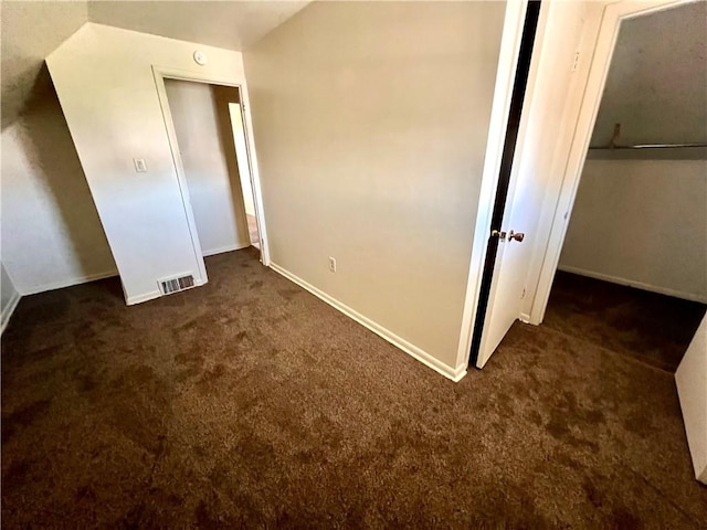 1244 Maple Ave, Monessen, PA 15062 - unfurnished bedroom featuring dark colored carpet and baseboards