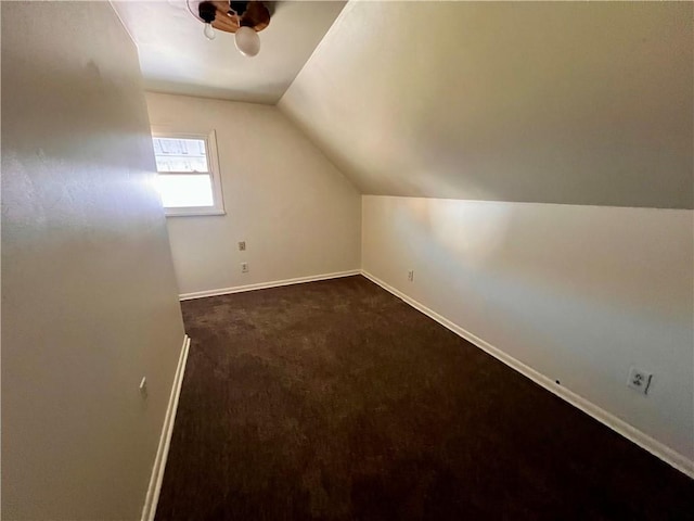 1244 Maple Ave, Monessen, PA 15062 - additional living space featuring vaulted ceiling, baseboards, and dark colored carpet