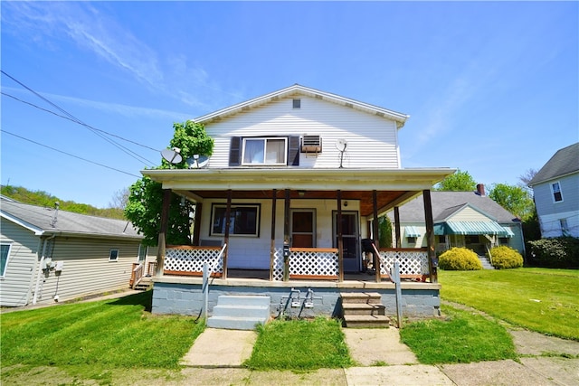 view of front of property featuring covered porch and a front yard