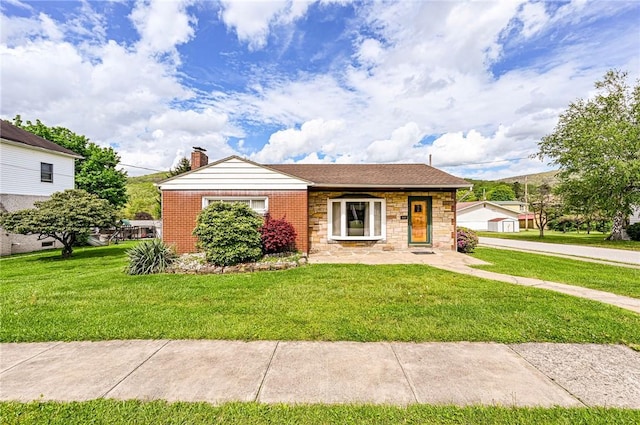 642 Washington St, Fairfield Twp, PA 15923 - view of front of property featuring stone siding, a front lawn, and a chimney