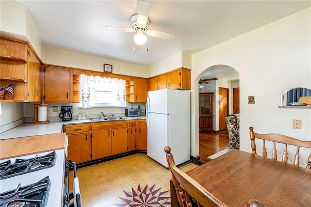 642 Washington St, Fairfield Twp, PA 15923 - kitchen featuring white appliances, open shelves, a ceiling fan, and light countertops
