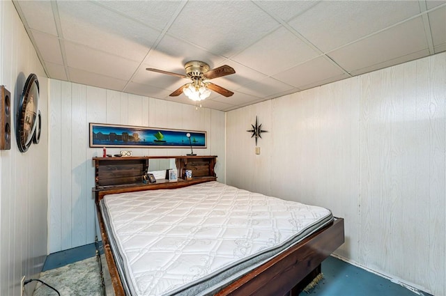 642 Washington St, Fairfield Twp, PA 15923 - bedroom featuring ceiling fan, a drop ceiling, and concrete flooring