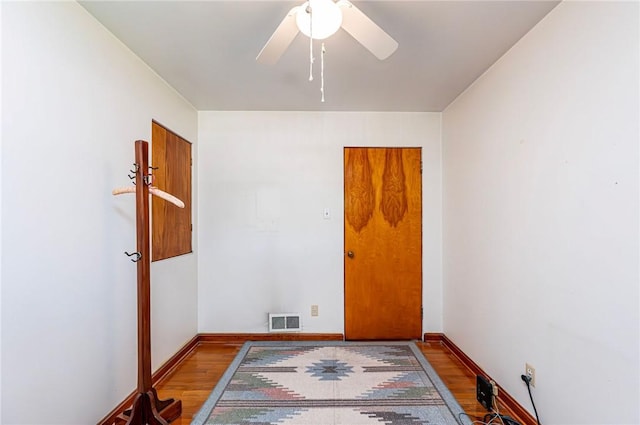 642 Washington St, Fairfield Twp, PA 15923 - empty room with wood finished floors, ceiling fan, and baseboards