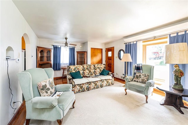 642 Washington St, Fairfield Twp, PA 15923 - living area with arched walkways and a ceiling fan
