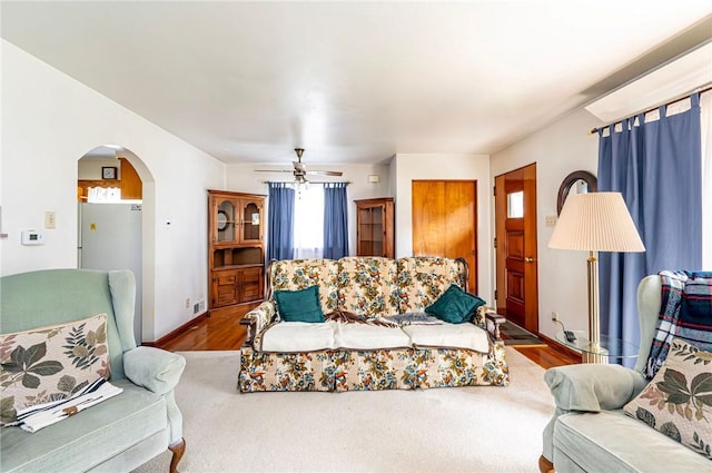 642 Washington St, Fairfield Twp, PA 15923 - living room featuring arched walkways, wood finished floors, and ceiling fan