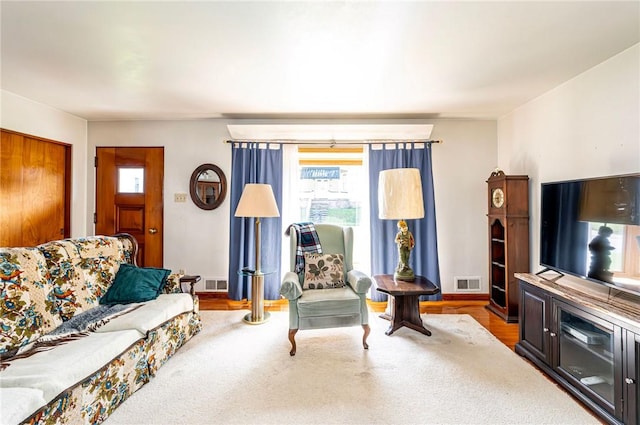642 Washington St, Fairfield Twp, PA 15923 - living area featuring healthy amount of natural light, baseboards, and wood finished floors