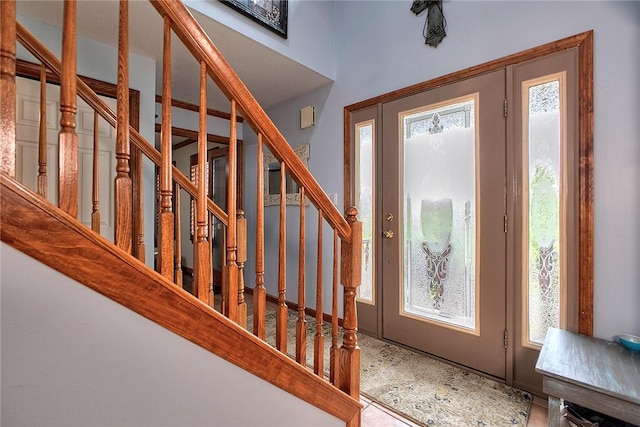 1057 Finchley Rd, North Huntingdon, PA 15642 - foyer with stairway and healthy amount of natural light