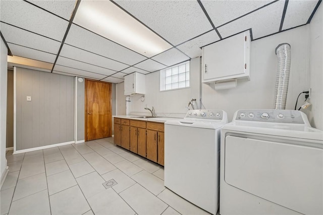 329 Sarah St, Mckees Rocks, PA 15136 - laundry room featuring cabinet space, baseboards, and independent washer and dryer