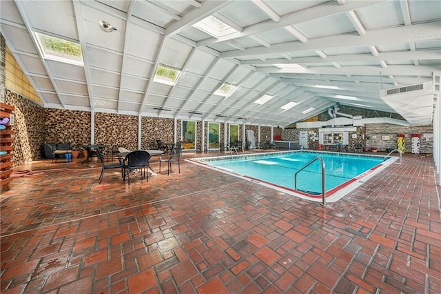 indoor pool with a patio