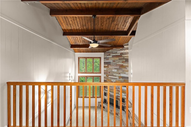 corridor with wood ceiling and beam ceiling