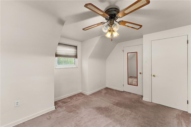 bonus room featuring carpet, ceiling fan, baseboards, and lofted ceiling