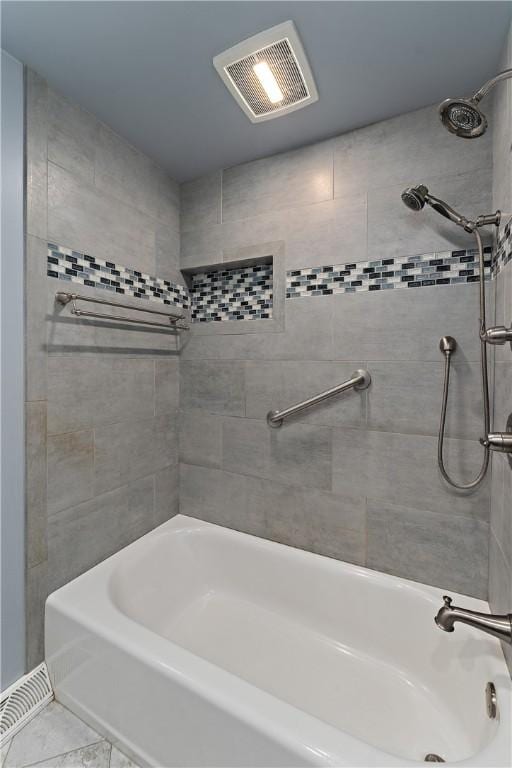 full bath featuring tub / shower combination