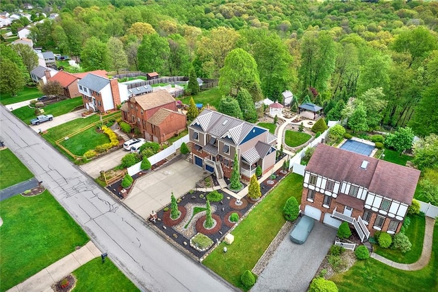 aerial view of residential area with a forest