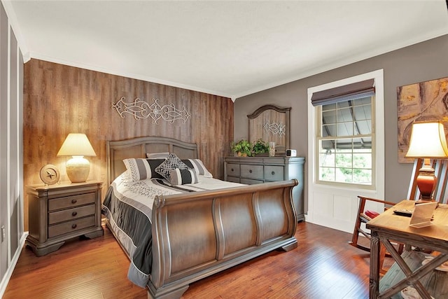 bedroom with wood finished floors