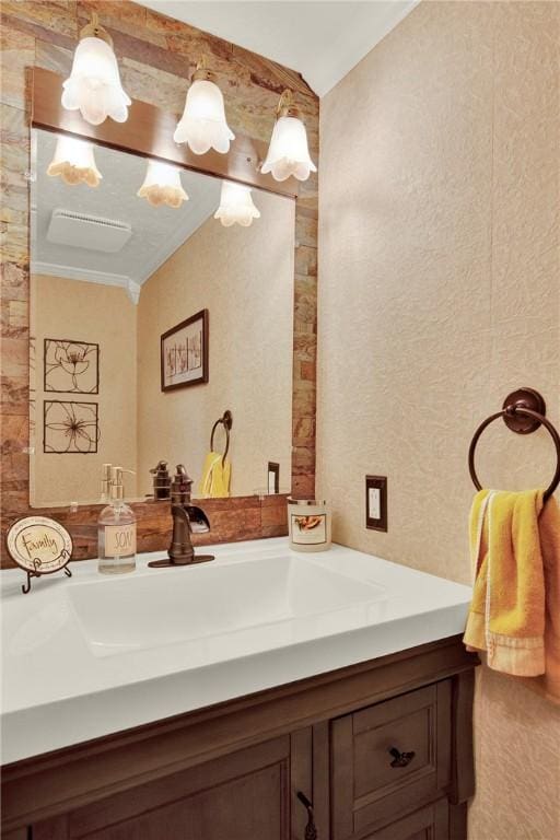 bathroom with vanity and lofted ceiling