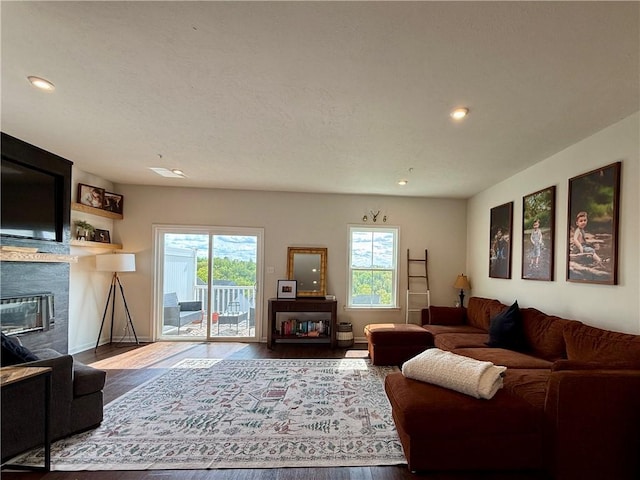 159 Cole Dr, Robinson Twp Nwa, PA 15136 - living room with a glass covered fireplace, wood finished floors, baseboards, and recessed lighting