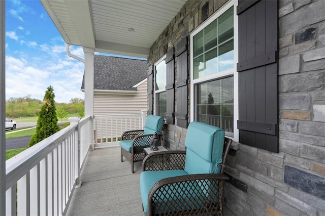balcony featuring a porch