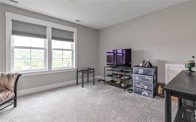 office with carpet flooring and baseboards