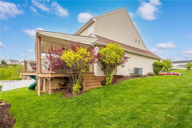 back of house with stairs, a wooden deck, and central AC unit