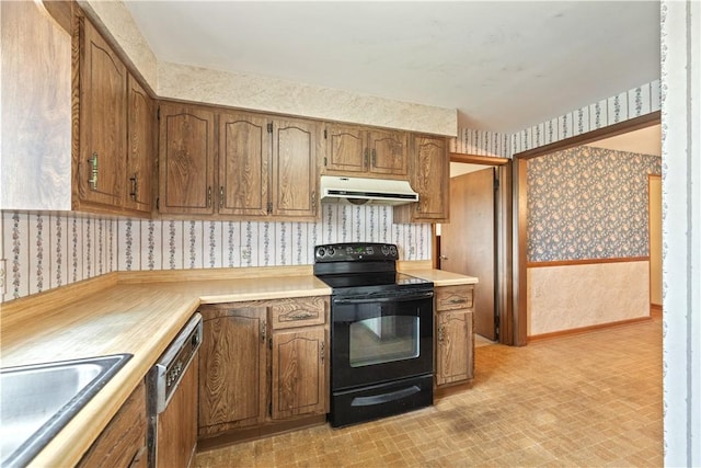 639 Scenery Dr, Elizabeth Twp/Boro, PA 15037 - kitchen with wallpapered walls, black range with electric cooktop, under cabinet range hood, dishwasher, and light countertops