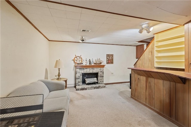 639 Scenery Dr, Elizabeth Twp/Boro, PA 15037 - living room featuring crown molding, light colored carpet, baseboards, and a fireplace
