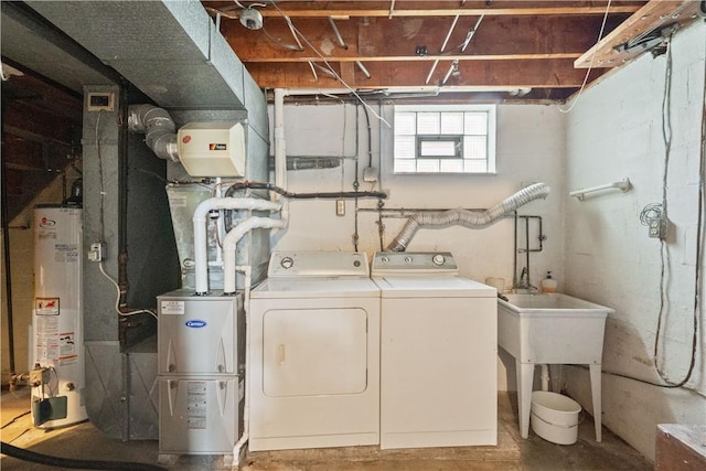 639 Scenery Dr, Elizabeth Twp/Boro, PA 15037 - laundry room featuring gas water heater and independent washer and dryer
