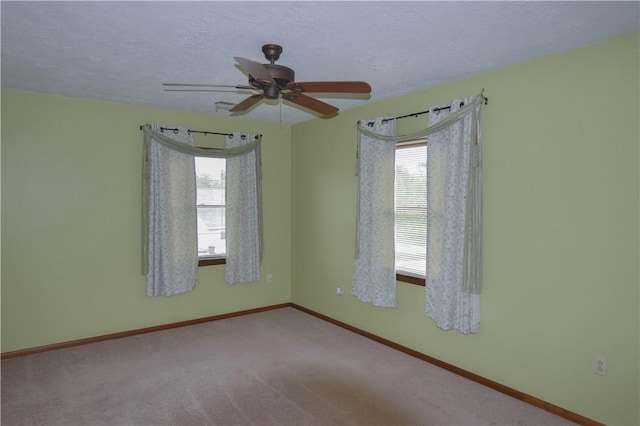 103 Hemlock Ct, Saxonburg Boro, PA 16056 - spare room with ceiling fan, baseboards, carpet, and a textured ceiling