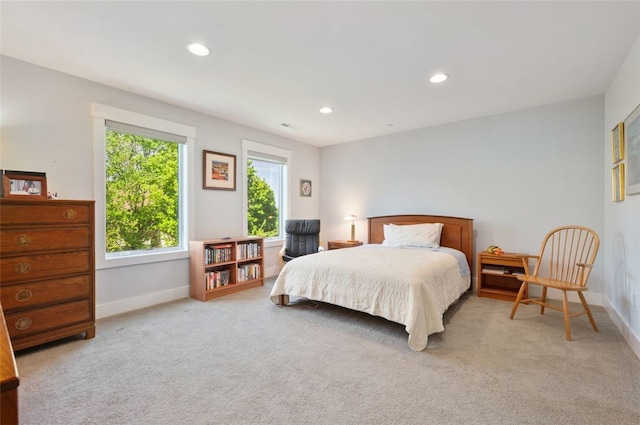 bedroom featuring carpet, baseboards, and recessed lighting