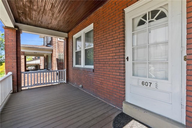 wooden deck with a porch
