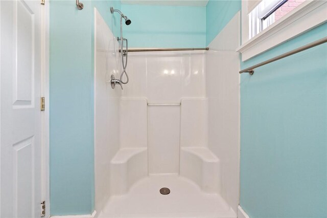 bathroom featuring a shower