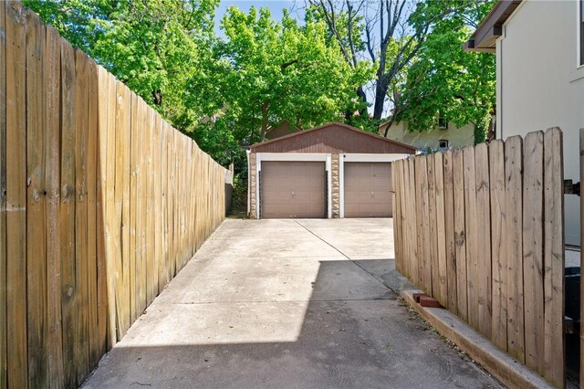 detached garage with fence