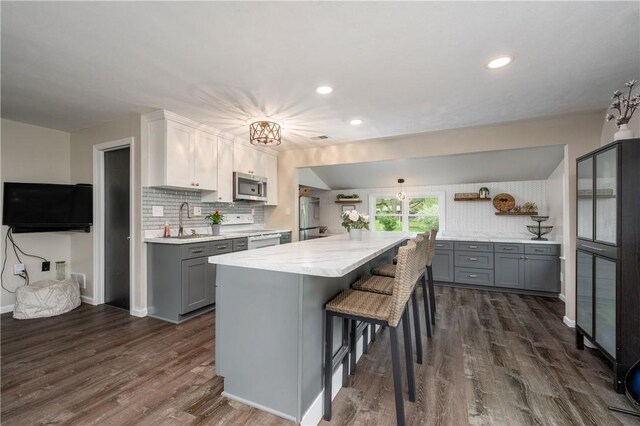 145 Robinson Pl, Perry Twp Arm, PA 16041 - kitchen with appliances with stainless steel finishes, gray cabinets, dark wood-type flooring, a sink, and recessed lighting