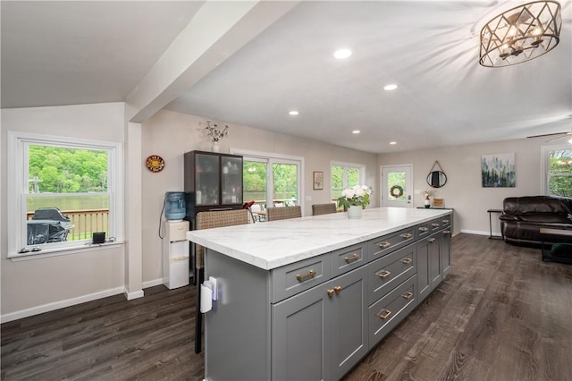 145 Robinson Pl, Perry Twp Arm, PA 16041 - kitchen featuring gray cabinetry, baseboards, dark wood-style flooring, a kitchen island, and recessed lighting
