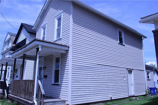 view of home's exterior with covered porch