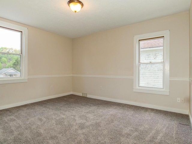 411 4th St, Darlington, PA 16115 - carpeted empty room featuring baseboards
