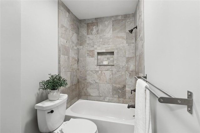 bathroom with toilet and shower / bathtub combination