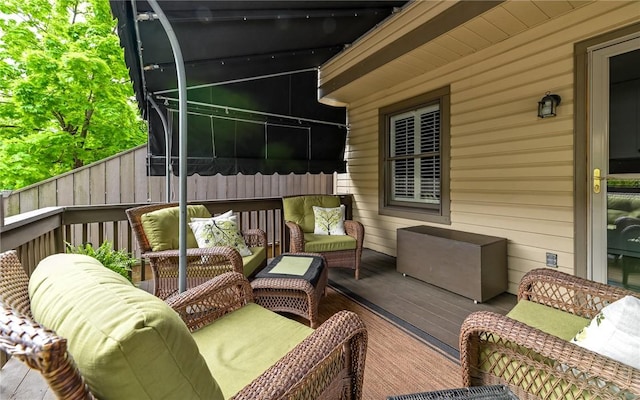 deck with an outdoor hangout area