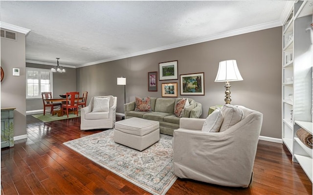 living area with a chandelier, baseboards, a textured ceiling, crown molding, and dark wood-style flooring