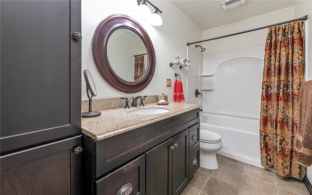 bathroom featuring toilet, vanity, shower / bath combo, and tile patterned floors
