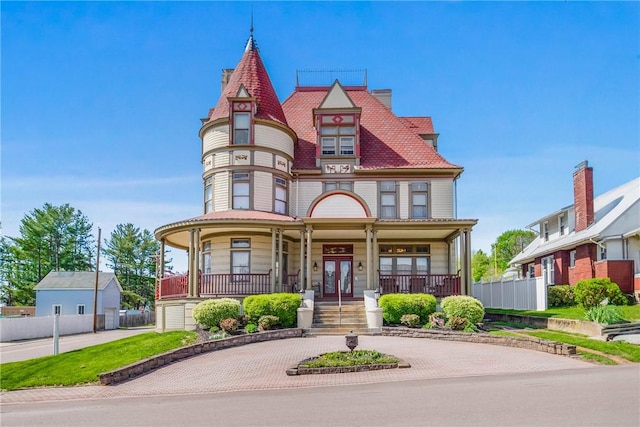 301 Meyers Ave, Meyersdale Boro, PA 15552 - victorian-style house featuring covered porch, fence, and french doors