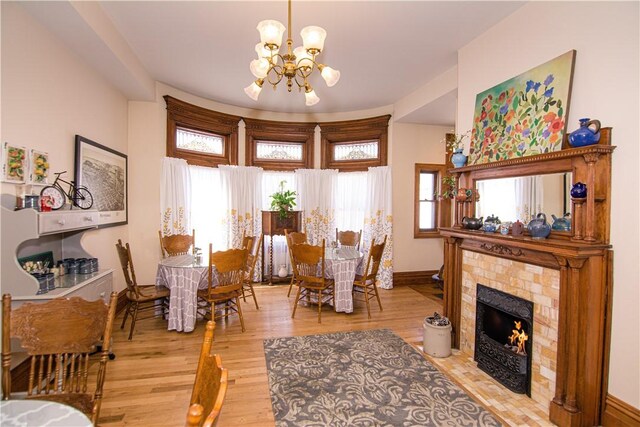301 Meyers Ave, Meyersdale Boro, PA 15552 - living area with a chandelier, wood finished floors, baseboards, and a tile fireplace