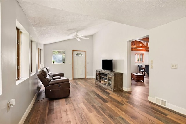 192 Wilkins Hollow Rd, Addison Twp, PA 15411 - living area featuring vaulted ceiling, a textured ceiling, ceiling fan, wood finished floors, and baseboards